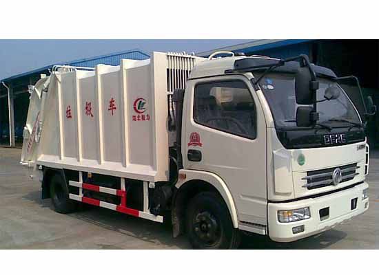 正宗國五東風(fēng)多利卡5-6方壓縮式垃圾車